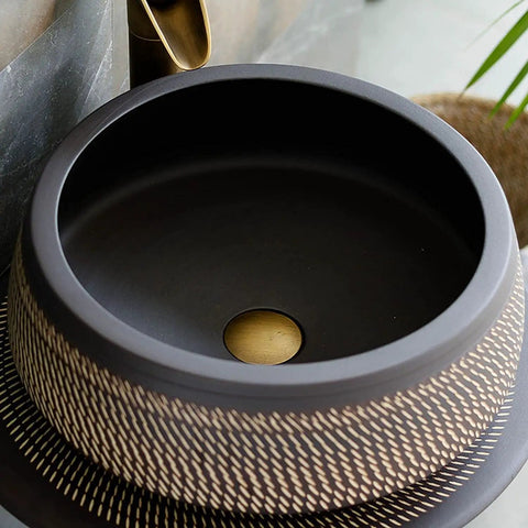 Ceramic Bathroom Sink Art Sink, Floor-standing column ceramic basin with textured black finish and brass drain.
