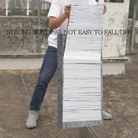 Heavy Duty Self Adhesive Flashing Tape Waterproof Roof Patch With Aluminum Foil Backing For Leak Repair Ice And Water Shield being held outdoors.