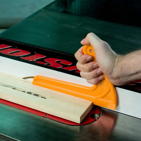Solid L Shape Wood Push Sticks, Kickback Killer Table Saw And Router Table Guide, reliable orange grip push stick in use.