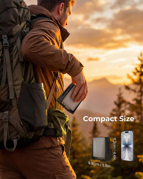Person holding folded Two Pack Rechargeable Camping Lanterns With 4000mAh Batteries, Dimmable LED Light during a sunset hike.