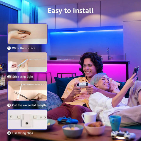 Couple enjoying 65.6 Foot Ultra Long RGB LED Strip Lights With Remote Control in living room, blue and pink ambient lighting