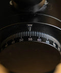 Close-up of adjustable control ring on the Killer Variable Speed Single Dose Coffee Grinder for precise grinding.