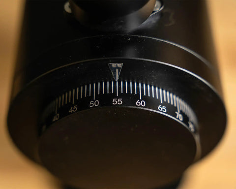 Close-up of adjustable control ring on the Killer Variable Speed Single Dose Coffee Grinder for precise grinding.