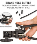Hydraulic Disc Brake Hose Cutter And Driver 2 In 1 Bike Tool in use, showing sharp blade and push-to-raise design.