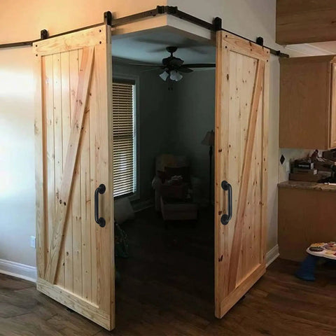 Interior view with barn doors fitted with 2 Pack 12 Inch Black Industrial Pipe Handrails For Indoor Outdoor Stairs And Decks