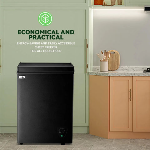 Compact Black Chest Freezer With 3.5 Cubic Feet Capacity in a kitchen, space-saving top design, for meat and seafood storage.