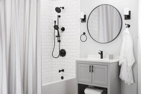 Bathroom featuring Neo 7 Shower Arm And Flange In Matte Black With Solid Brass Construction Includes Arm And Flange Durable Metal Build Limited Lifetime Warranty No Fuss Install Modern Bath Upgrade For Better Shower Performance against white tiled wall.