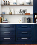 10 Pack Brushed Nickel Cabinet Pulls 3 Inch Hole Centers, 6 Inch Total Length, 1.34 Inch Height Stainless Steel Handles on blue kitchen drawers.