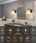 Sleek Matte Black Rechargeable Wall Sconces Set Of Two Wireless Dimmable Led Lights With Remote Easy Setup For Bedroom And Living Room All Day Battery Operated Lamps Heavy Duty Build Badass Style mounted beside a mirror.