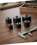 Heavy Duty Machine Shaft End Protectors With Precision Fit For Jjf Gripomatic Pullers, various sizes on table.