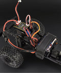 Beefy 25A Waterproof Micro Brushed ESC installed in RC crawler chassis, ideal for SCX24 1x24 and TRX4M 1x18 models, 2-3S LiPo ready.