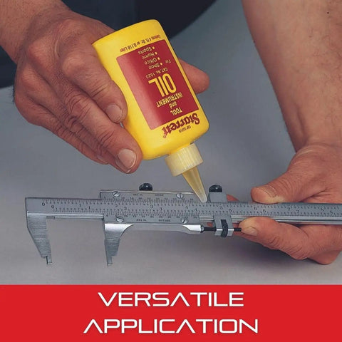 Applying extra-fine instrument oil for measuring tools and precision instruments, light machinery lubricant on a caliper for maintenance.
