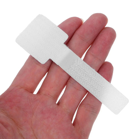Self Adhesive Cable Straps Keep Your Desk Clean And Tangle Free Bundle Wires Fast With Reusable Hook And Loop Design held in hand.