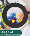 5X and 10X magnifying lamp with stand clamp lighted magnifier for close work, showing embroidery details through glass lens