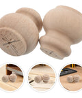 2-Piece Solid Wood Table Leg Set With 3-Inch Unfinished Bun Feet, shown unfinished with visible rustic grain, ideal for DIY projects.