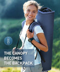 Person carrying foldable Beach Chair With Canopy Shade as backpack in outdoor setting, showing portable feature for camp and tailgating.