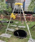 Darn Sturdy Portable Emergency Rescue Tripod With 30 Meter Winch And Legit Aluminum Frame For Deep Well Sewer And Tight Job Sites 440 Lbs Heavy Duty Adjustable Rope System in yard.