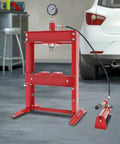 Rock Solid 10 Ton Hydraulic Benchtop Press Adjustable Height Worktable Built For Real Grease Monkeys With Accurate Pressure Gauge and Heavy Duty Steel Frame in workshop setting.