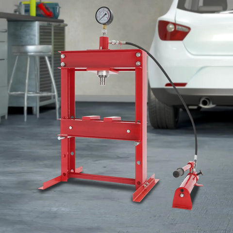 Rock Solid 10 Ton Hydraulic Benchtop Press Adjustable Height Worktable Built For Real Grease Monkeys With Accurate Pressure Gauge and Heavy Duty Steel Frame in workshop setting.
