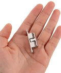 Solid Silver Copper Cabinet Door Rollers With Silent Close And Rust Resistant Finish, 10 Pack Secure Hardware held in a hand.