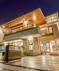 Modern house illuminated by Ultra Bright PAR38 LED Flood Light Bulbs Delivering 3200 Lumens, Dimmable Outdoor Spotlight, 3000K Warm White
