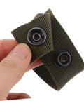 Hand holding green nylon belt buckle with quick release snap, part of Six Pack Durable Nylon Belt Buckle Quick Release Webbing Clips For Outdoor Activities Camping Gear Training And Tough Equipment Attachment Versatile Strap Accessories.