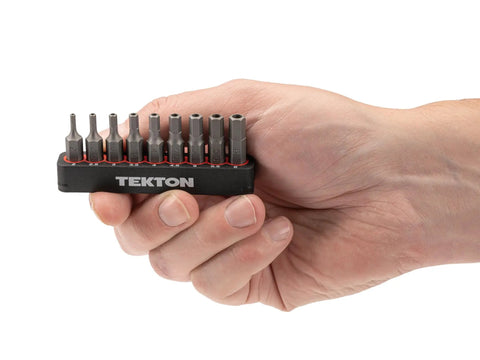 Person holding tamperproof quarter inch hex bit set with rail 9 piece security Allen bits extra long 30 mm length