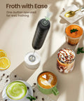 Rechargeable Milk Frother Handheld USB C Foam Maker With Detachable Stainless Steel Whisk on a table with drinks