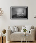 Vintage Framed Print Of Wilson Dam And Hydroelectric Plant Turbine And Generator Spanning The Tennessee River At Wilson Dam Road In Muscle Shoals AL Wall Art For History Buffs Reproduction From Library Of Congress Archive displayed above a sofa in a living room.
