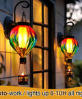 Dope Solar Hot Air Balloon Lantern With Flickering Flame Outdoor Waterproof Glass And Metal Hanging Light on a wall