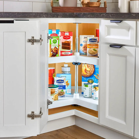 Two Tier Kidney Shaped Lazy Susans For Corner Base Cabinets Plastic White 28 Inch Wide, 22.5 Inch Deep, 26 Inch High Space Saving Swivel Kitchen Organizer For Spices And Cans With Easy Inside Cabinet Install, displaying spices and pantry items.