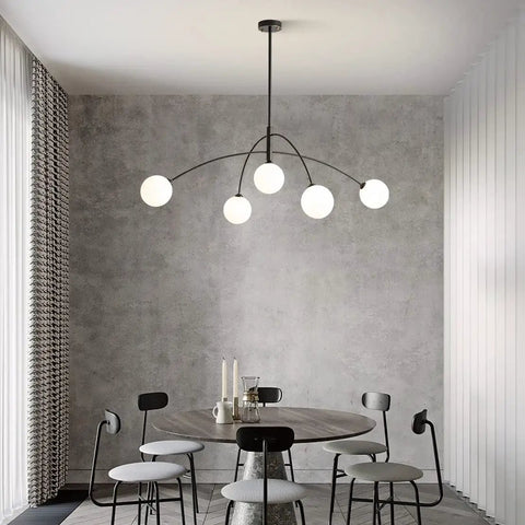 Matt Black Sputnik Chandelier Five Light Pendant, Mid Century Modern Industrial Vibe, Height Adjustable in dining room