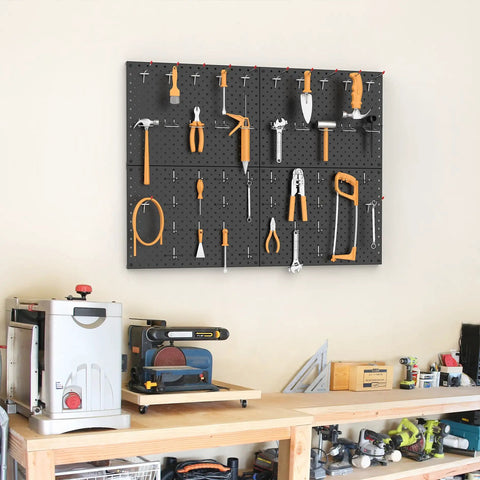 Four Piece Twelve By Sixteen Inch Metal Pegboard Panels Built Tough For Your Garage, Workbench And Shop, Modular Wall Mounted Pegboard With One Eighth Inch And One Quarter Inch Holes, Black, mounted on wall holding tools.