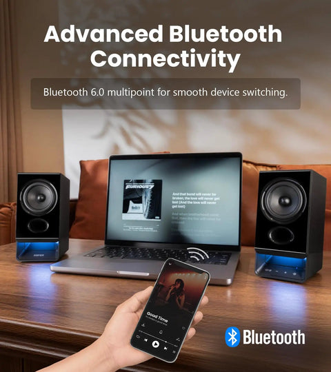 Desktop Speaker System With 2.75 Inch Full Range Drivers And Bluetooth 6.0 shown with laptop and smartphone on wooden desk