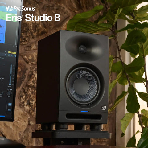 8 Inch 2 Way Active Studio Monitors With EBM Waveguide for Crisp Highs and Tight Bass on stand in studio room