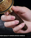 Copper Hand Held Prayer Wheel For Home And Office Decor, Tibetan Buddhist Hand Turn Praying with wood handle close-up