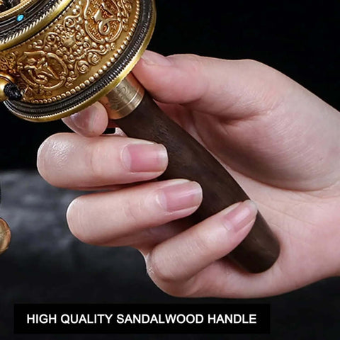 Copper Hand Held Prayer Wheel For Home And Office Decor, Tibetan Buddhist Hand Turn Praying with wood handle close-up
