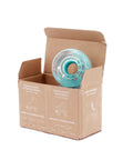 Outdoor Roller Skate Wheels 38mm By 62mm 80A Turquoise 4 Pack Durable Urethane in open box showing one wheel