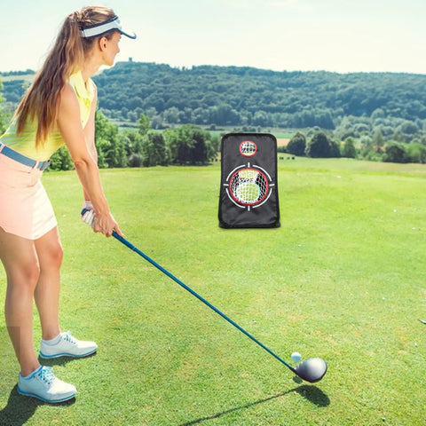 Woman practicing golf with Heavy Duty Golf Chipping Net Folding Practice Simulator For Backyard Training And Home Office Use in field