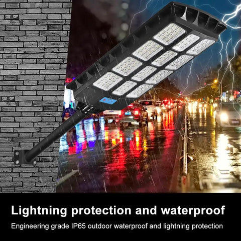 Ultra Bright Solar Street Light Outdoor Waterproof 80000LM mounted on a brick wall in a rainy street scene