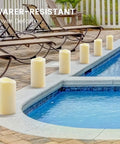 2 Pack Outdoor Flameless LED Pillar Candles With Remote And Timer by poolside, waterproof design for patio use, 3x5.5 inch