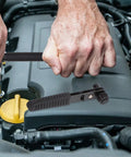 Compact Mini Ratcheting Wrench And Socket Tool Kit Tough As Nails Steel Spanners in use on an engine, showcasing heavy-duty construction.