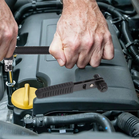 Compact Mini Ratcheting Wrench And Socket Tool Kit Tough As Nails Steel Spanners in use on an engine, showcasing heavy-duty construction.