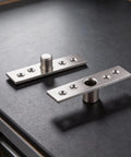 2 Pack 360 Degree Stainless Steel Pivot Hinges for Doors and Cabinets Upper and Lower Swivel Ball Bearing Hardware Kit Rust Resistant Silver Finish for Wooden Doors and Cabinets displayed on dark surface