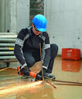 Compact 18V Brushless Cordless Angle Grinder With 125 MM Disc And Rock Solid Dust Resistant Design For Workhorse Cutting And Heavy Duty Grinding Tasks Tool Body Only in use on metal rebar.