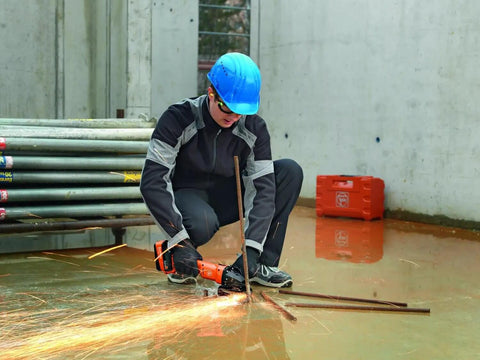 Compact 18V Brushless Cordless Angle Grinder With 125 MM Disc And Rock Solid Dust Resistant Design For Workhorse Cutting And Heavy Duty Grinding Tasks Tool Body Only in use on metal rebar.