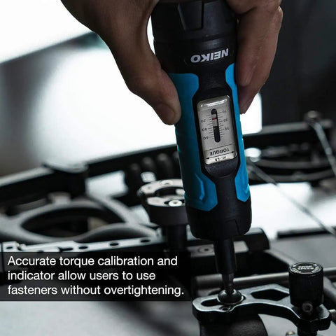 Close-up of a 10574A 1/4 Inch Drive Torque Wrench And Screwdriver Set with 30 S2 Steel Bits adjusting a scope mount.