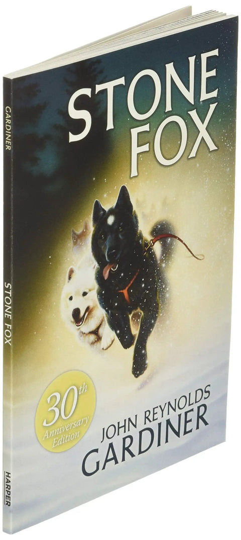 Book cover showing two sled dogs running, with title 'Stone Fox' and author John Reynolds Gardiner. 30th Anniversary Edition.