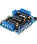 4 Way L293D DC Motor Driver Shield for Arduino Uno Mega Raspberry Pi, showing connectors and chips, blue expansion board.
