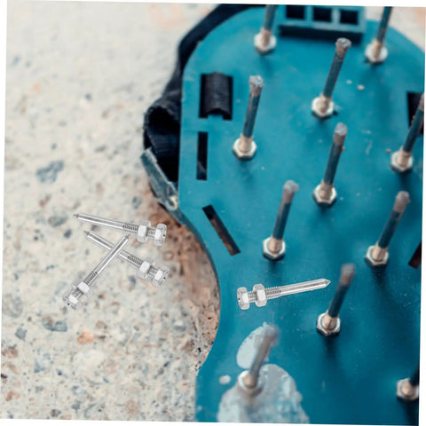 Close-up of 20-Piece Lawn Aerator Shoes With Metal Spikes on a blue sole, highlighting durable spikes for better soil health.